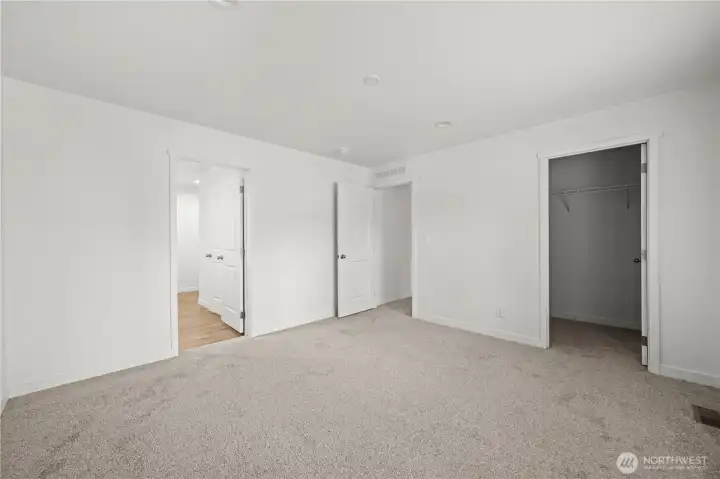 Another view of the primary bedroom.