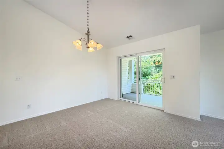 Opens to private deck! Fire up that grill!