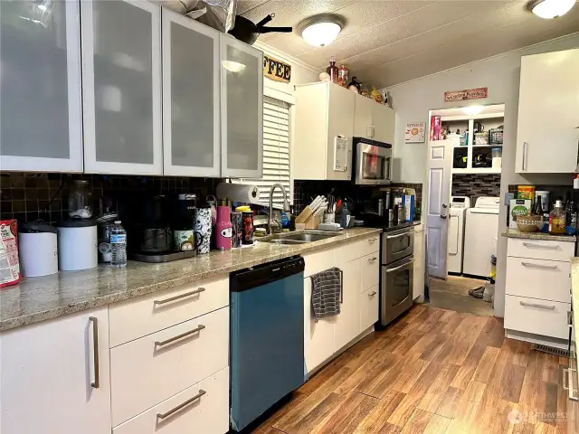 Kitchen with SS appliances and new granite countertops