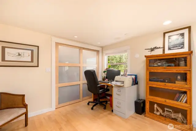 Spacious office filled with natural light and ample storage options