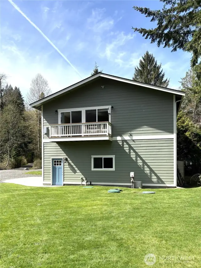 This 1100 square foot office includes a balcony that provides a serene view of the water