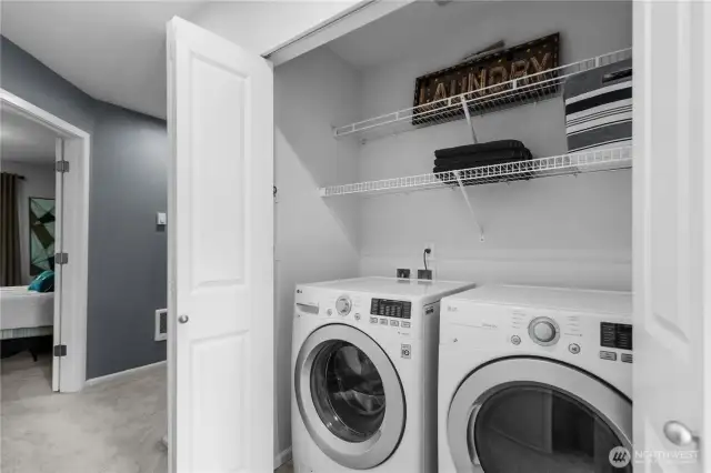 Full size washer and dryer conveniently located on the upper level near the bedrooms.