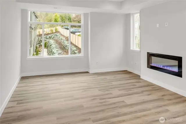 Bright and airy living space, with LVP flooring