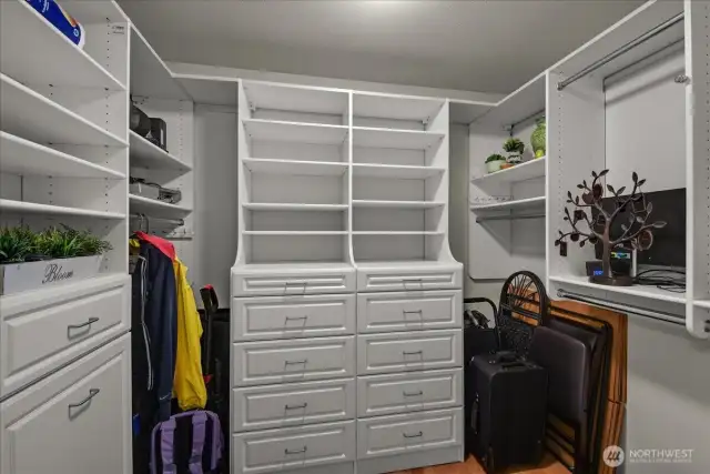 Primary bedroom walk in closet