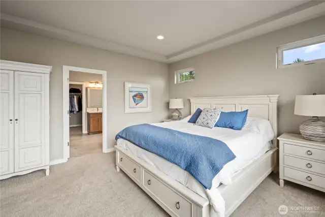 Primary Bedroom with an attached bathroom