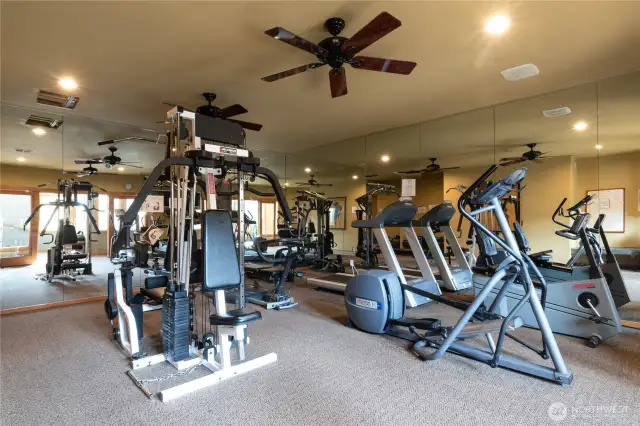 Modern shared fitness center with state-of-the-art cardio machines, free weights, and exercise stations. Convenient on-site gym designed for a healthy lifestyle, perfect for residents who value wellness and easy access to workout facilities.