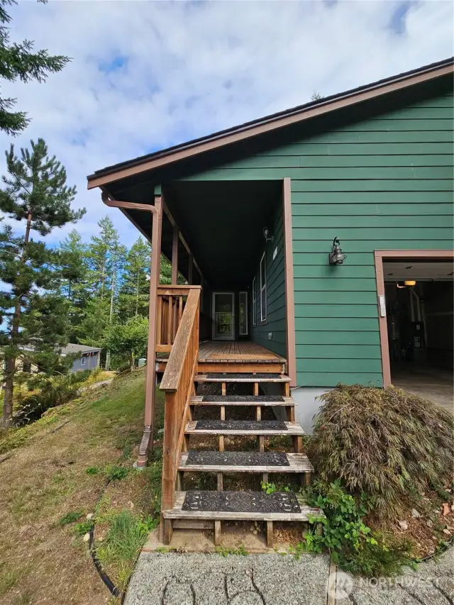 There is a large deck on the front of the home which is large enough for bistro tables and chairs to enjoy the views.  Loads of potential here!