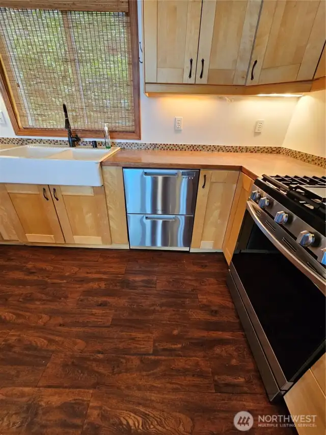 Custom features in teh cabinets and finishes as well as in the appliances.  How about a double door dishwasher that can handle large or small loads and even warm your plates!