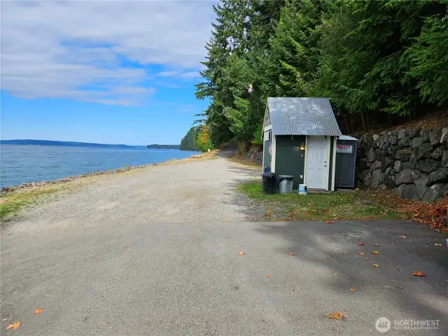 Looking across the roadway at the private community beach area and the Ricketts Beach club house
