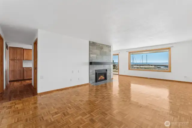 Spacious living room with stunning Puget Sound and island views.