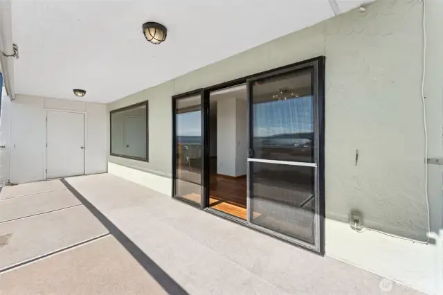 Expansive deck, among the largest in the complex, ideal for entertaining.