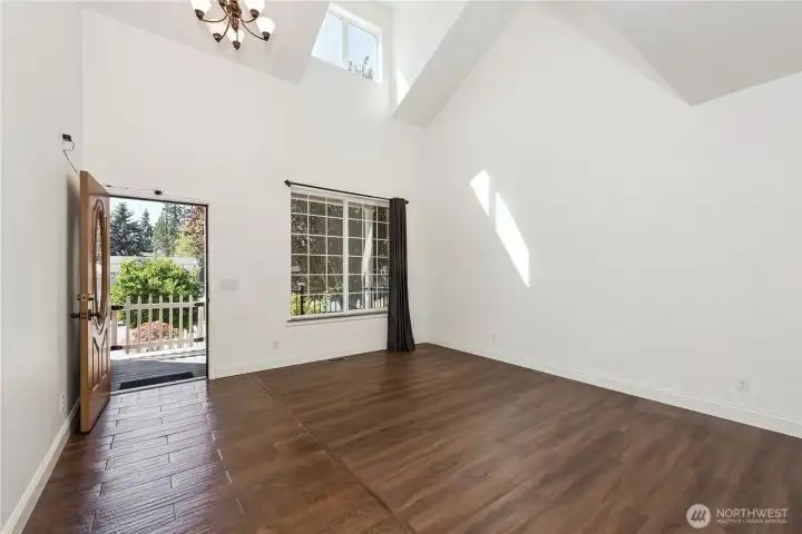 Vaulted ceilings and an open floor plan create an airy, light-filled living space.