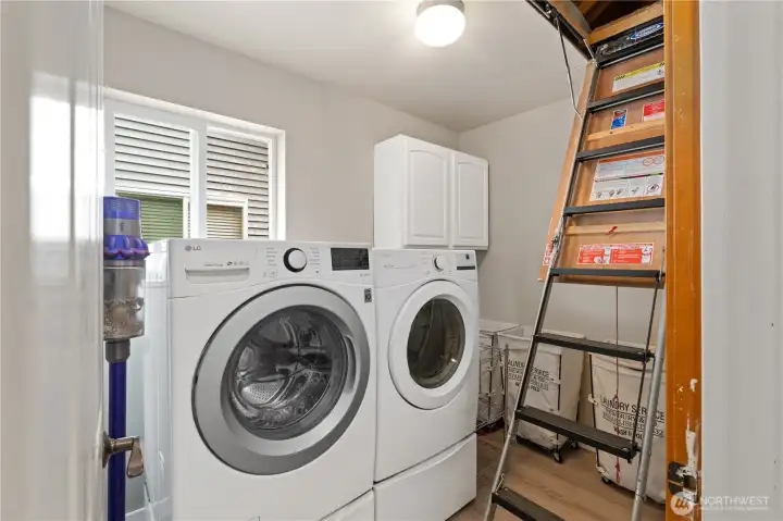 Simply pull down the string and a HUGE attic storage area opens for your pleasure!