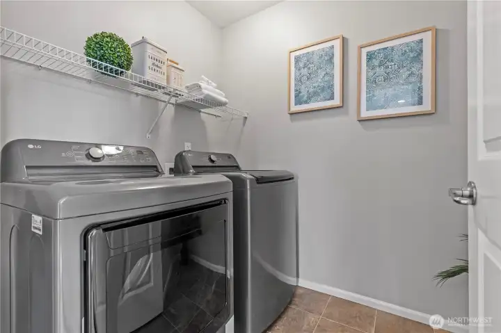 Central upstairs laundry room - newer washer and dryer stay!