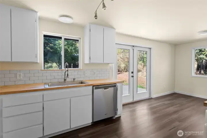 Brand new butcher block counter tops.