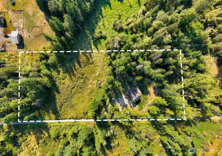 5-acre lot with easement off of Loomis Trail Rd., private road extension of Kickerville Rd. Only home on that road.