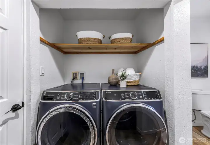 Upper level washer and dryer space.