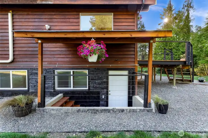 Main lower level entry from the right side of the home.