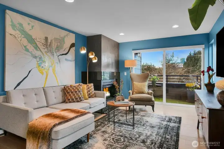 Step into light-filled interiors with downtown views rising in the background.