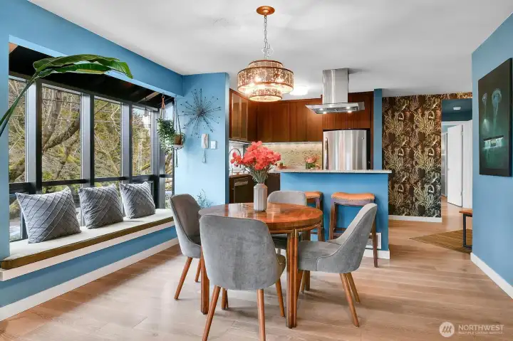 Fully remodeled interiors are spanned by bright windows, including an atrium window seat.