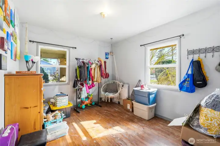 Second bedroom with dual windows for natural light.