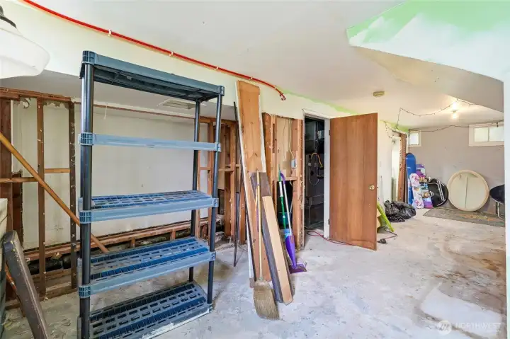 The unfinished basement offers a fantastic opportunity for a workshop, home gym, or additional finished living space.