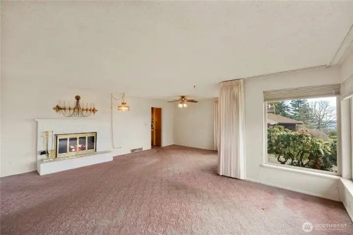 Living room with wood burning fireplace