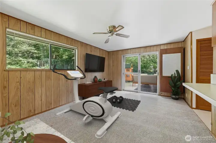 Family room has plenty of room for your toys, crafts, exercise or hobbies