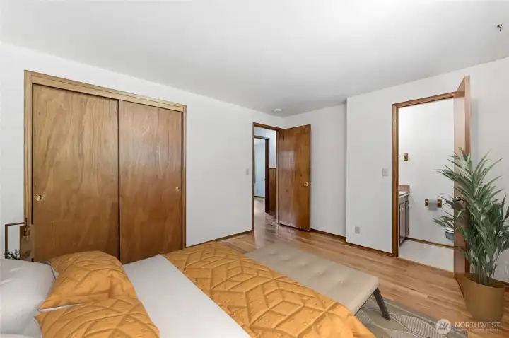 Primary bedroom and half bath