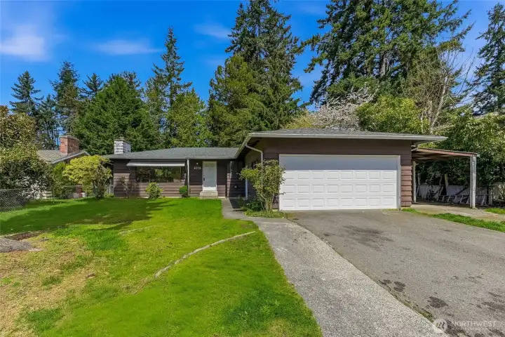 Wilcox Park is steps away from this front yard