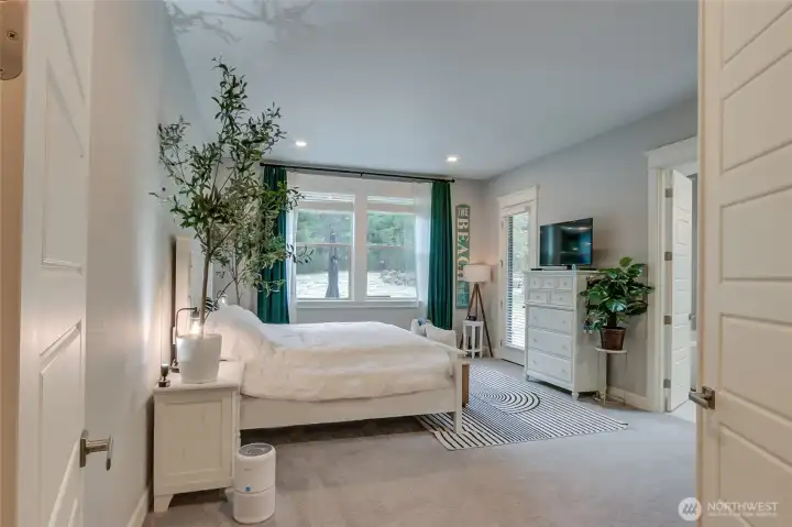French doors lead to the Master Suite on the Main