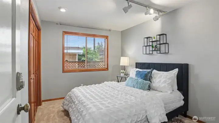 Main floor bedroom - perfect for guests or an office.