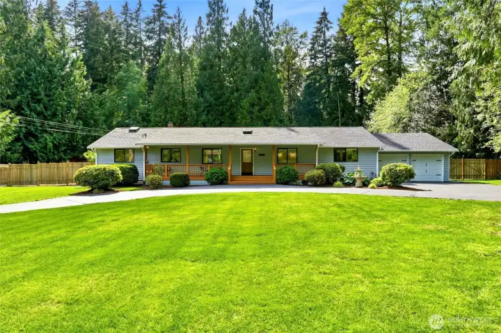 Welcome home to this beautifully updated rambler, perfectly positioned on a level, park-like lot with a circular driveway, mature landscaping, and exceptional privacy.