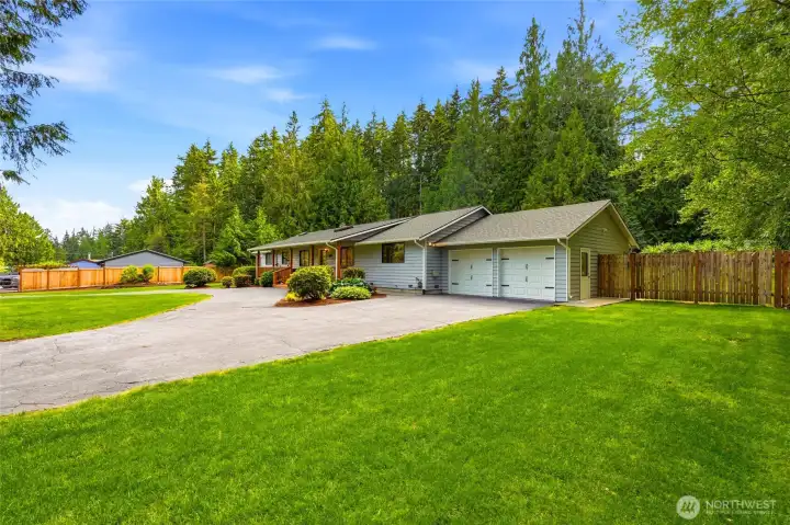 Expansive lawn and exceptional curb appeal.