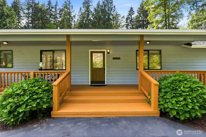 Covered front porch perfect for morning coffee.