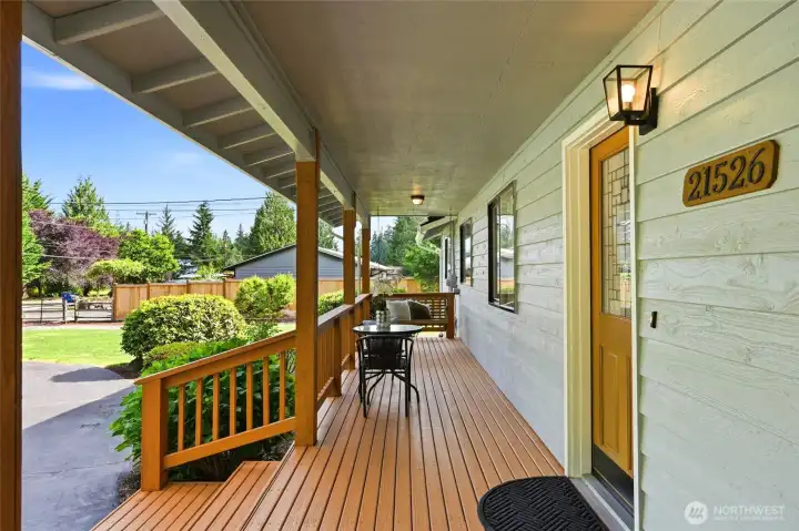 Freshly stained porch ready for summer mornings.