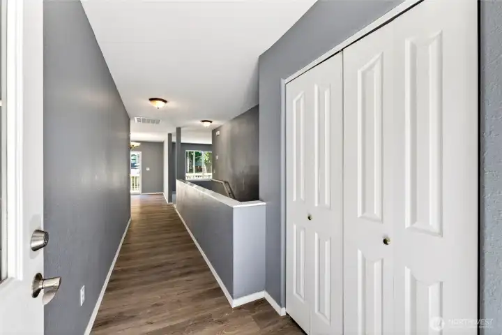 Large entry, coat closet to the right. Kitchen & dining area strait ahead.