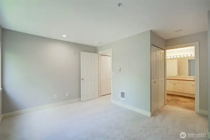View from bedroom to bathroom and hallway.