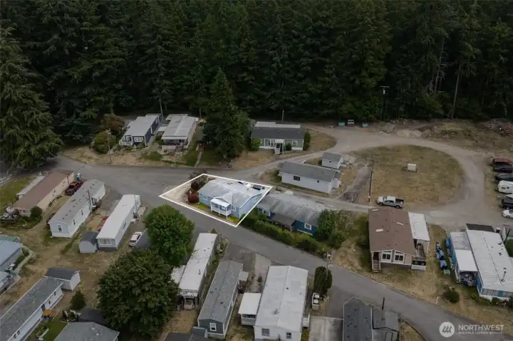 Subject property on corner lot at rear of park Subject property on corner lot at rear of park