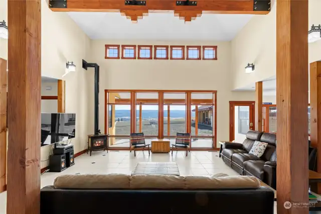 The design of this room is breathtaking with the tall ceilings, rows of windows, & timber accents.