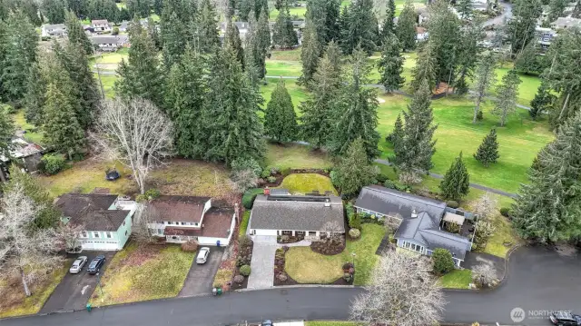 You will love the tree surround and golf course views from every angle of this home.