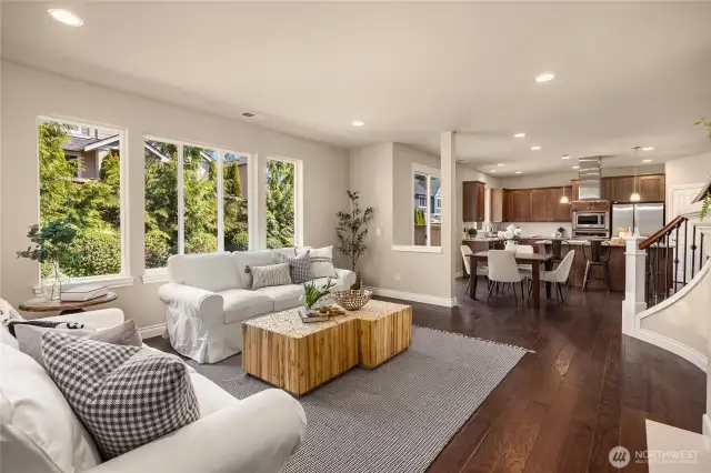 The family room with large picture windows out to the back garden.