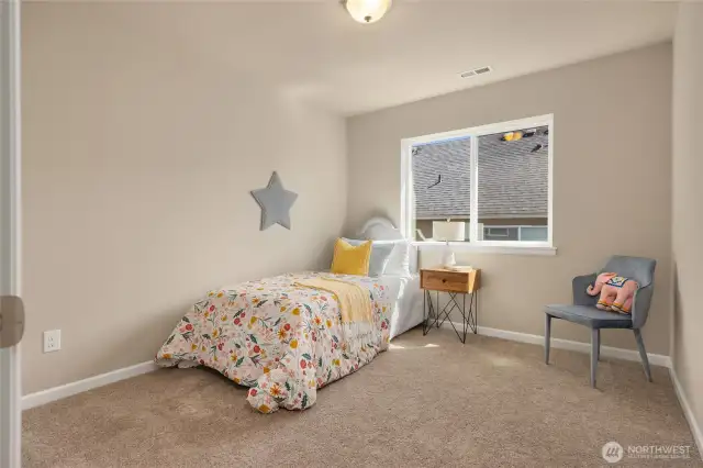 The fourth bedroom upstairs. All of the bedroom are nicely sized.