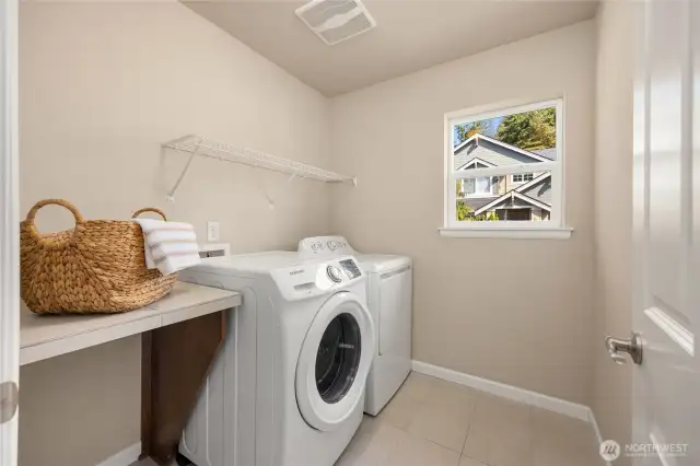 The upstairs laundry room. Ample storage closets are throughout the home too.