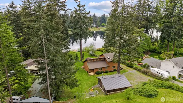 Welcome to peaceful lakefront living with oversized 2+ car garage and hobby space, level lot for potential DADU/in-law, and fully fenced & gated yard.