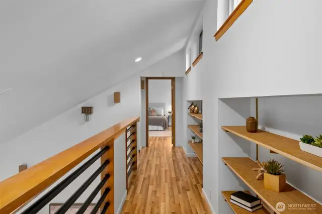 The loft is light and bright with options such as a reading library, office space, or a great homework area too.