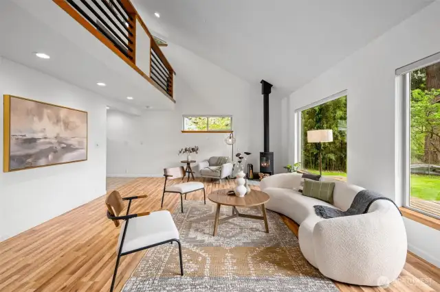 This versatile living space with workspace loft above allows for so many creative design options.