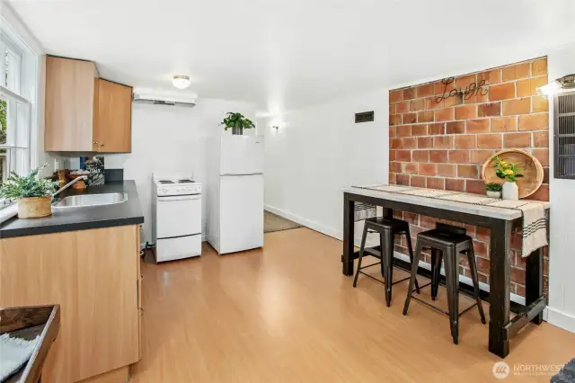 Sweet little kitchen w/sink, oven, fridge.