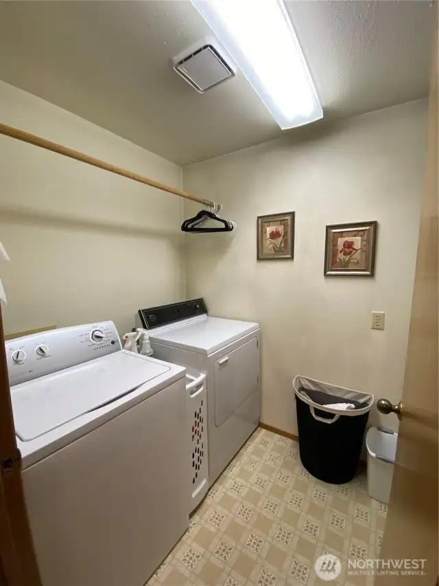Laundry immediately to the right of entry.