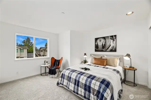 Upstairs bedroom. Large closet to the right of the bed.